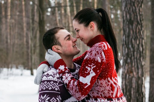 couple in snowy forest