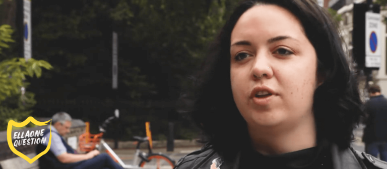 "ellaOne question" Still from an interview, showing a black haired woman