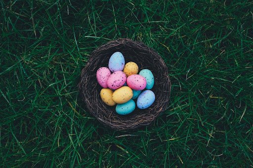 Multicoloured eggs in a basket