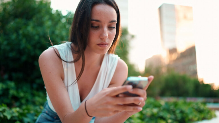 Woman checking her social media profile to determine timelines on when she might have had unprotected sex with her partner.